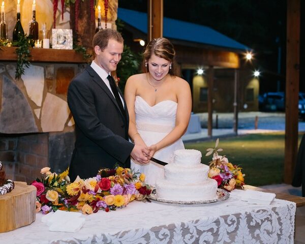 Cutting the wedding cake at the reception in the Pavilion.